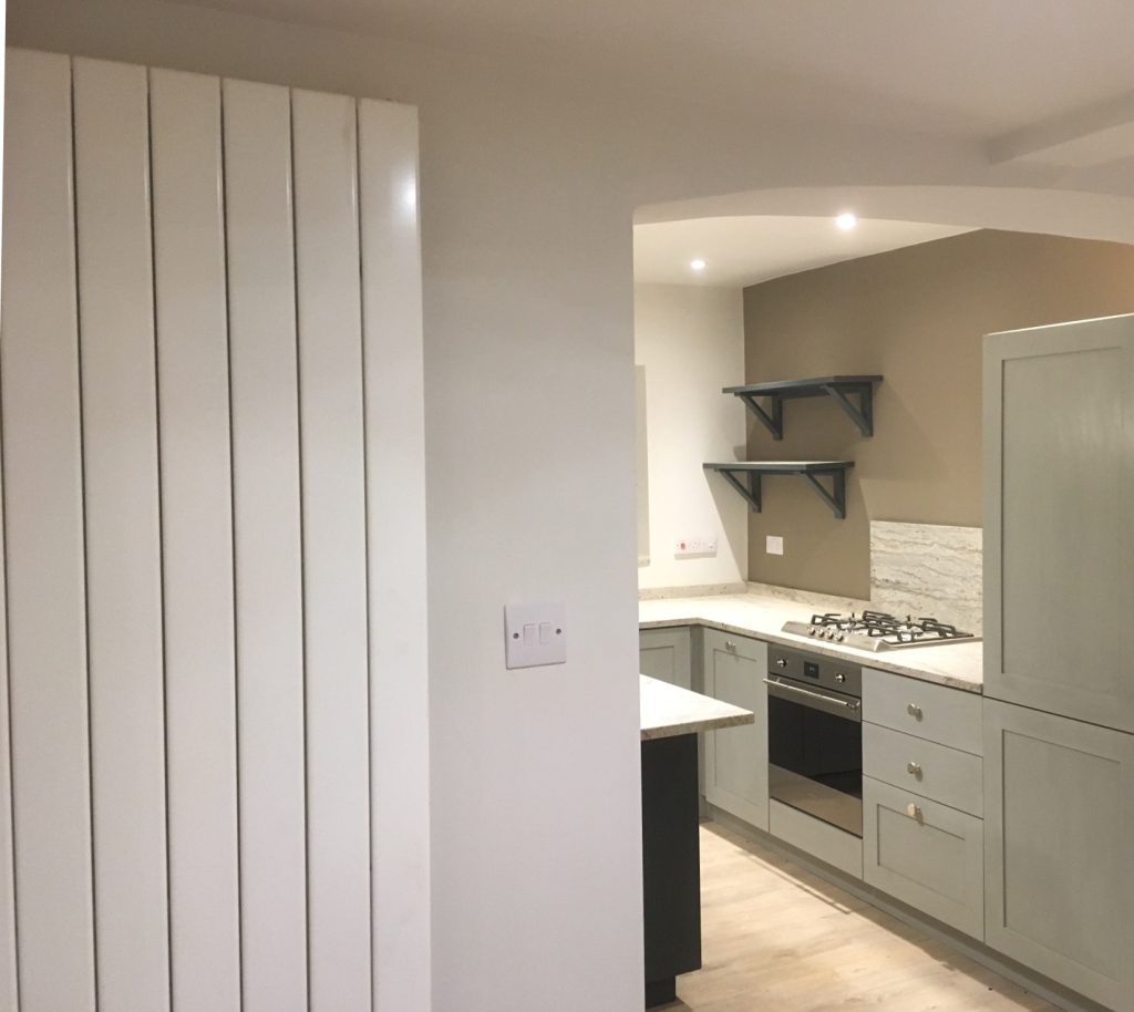 Domestic radiator with view toward kitchen